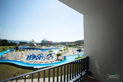 a view of a water park from a balcony at FAMILY APARTMENTs 3 in Vrnjačka Banja