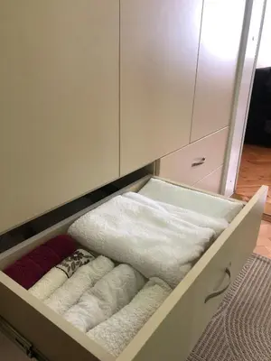 a drawer in a kitchen with towels in it at ANNI apartman in Paraćin