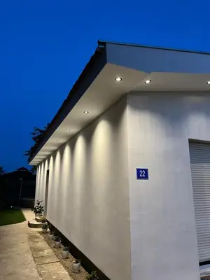 a building with a sign on the side of it at Apartman Soni Jagodina- free jacuzzi, private parking, pet friendly in Kolonije