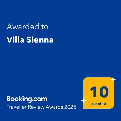 a yellow square with the text awarded to ville stinemania at Villa Sienna in Vrnjačka Banja