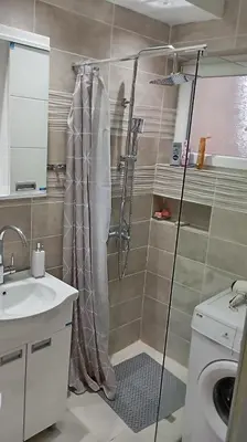 a bathroom with a shower and a sink at Lina apartment in Lebane