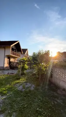 a house with the sun shining on a yard at Krupajska bajka in Krepoljin