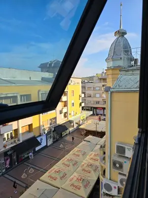 a view of a city from a window at Red Diamond in Niš
