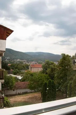 a view of the mountains from a house at Apartman Emilija i Julija in Soko Banja