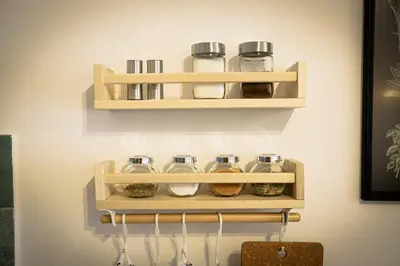 a wooden shelf with jars on a wall at Grey Apartment On the Hill in Vrnjačka Banja