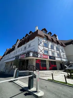 a large building on the side of a street at Ema - Jakov Kopaonik Kraljevi Čardaci in Kopaonik