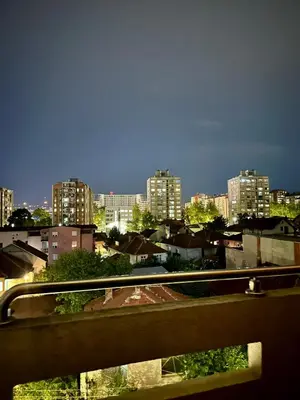 a view of a city skyline with tall buildings at PLANIS apartments in Niš