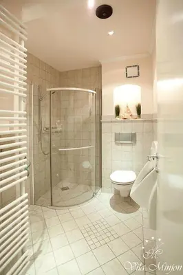 a bathroom with a shower and a toilet at Luxury Rooms Minjon in Vrnjačka Banja