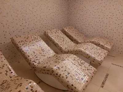 two chairs sitting next to a toilet in a room at Zepterme Apartman 605 Premium in Vrnjačka Banja
