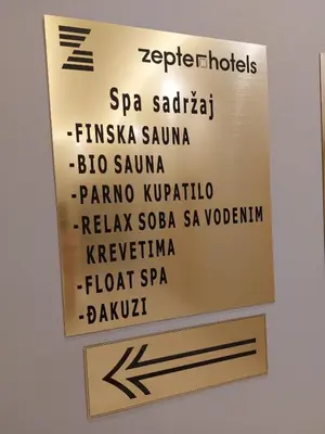 a sign on the wall of a restaurant with a bunch of names at Zepterme Apartman 605 Premium in Vrnjačka Banja