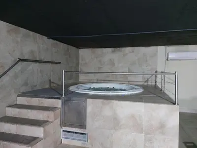 a bathroom with a large tub in a room at Zepterme Apartman 605 Premium in Vrnjačka Banja