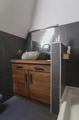 a bathroom with a sink and a bath tub at Guesthouse Šejn in Kopaonik