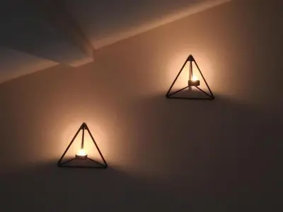 two lights are hanging on a wall at Vrnjačka Banja - Apartman Zen in Vrnjačka Banja