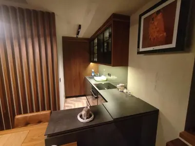 a kitchen with a sink and a counter top at Floid in Niš