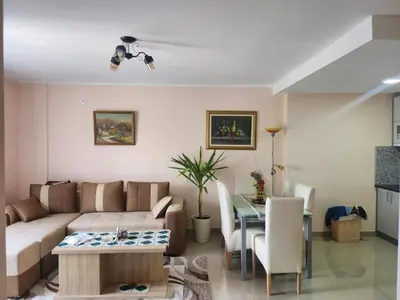 a living room with a couch and a table at Apartman Goca in Vrnjačka Banja