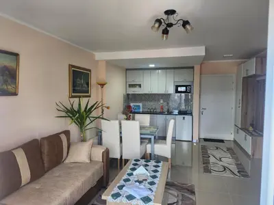 a living room with a couch and a table at Apartman Goca in Vrnjačka Banja