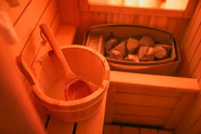 a wooden spoon and a bin of food in a room at Soko IN Spa in Soko Banja