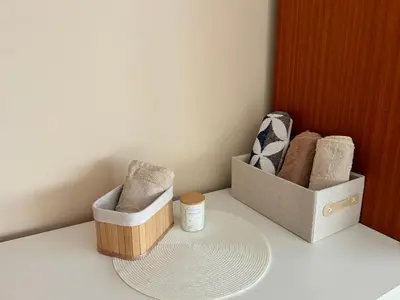 two baskets sitting on a counter next to a table at Apartman NANA in Ćuprija