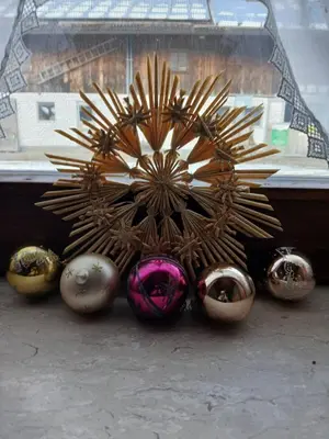 a group of balls sitting in front of a window at NinaRelax in Soko Banja