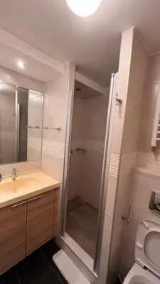 a bathroom with a shower and a sink and a toilet at Ski centar konaci Kopaonik in Kopaonik