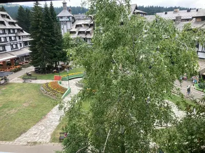 a view of a park with trees and buildings at Ski centar konaci Kopaonik in Kopaonik
