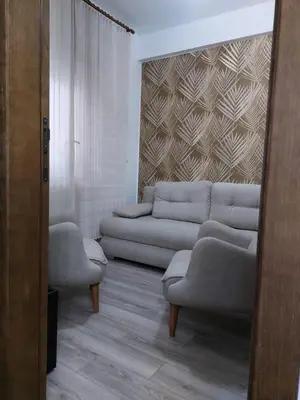 a living room with a couch and two chairs at Jagodina apartman MM AKVA PARK free garaža in Jagodina