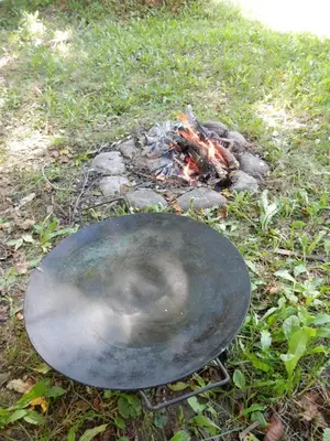 a metal plate sitting next to a fire at Villa Anja in Pirot