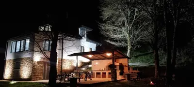 a house at night with lights on it at Villa Anja in Pirot