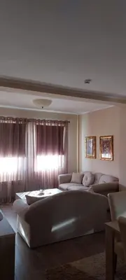 a living room with two couches and a couch at Mesečeva bajka in Kopaonik
