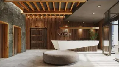 a lobby with a white bench in a room at Kopaonik Woodside Hotel SKI - SPA in Kopaonik
