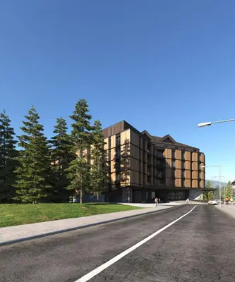 an empty road in front of a building at Kopaonik Woodside Hotel SKI - SPA in Kopaonik