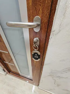 a wooden door with a lock on it at Ebra 75 Kraljevi Cardaci Kopaonik in Kopaonik