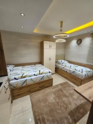a room with two beds in a room with at Ebra 75 Kraljevi Cardaci Kopaonik in Kopaonik