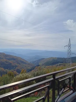 a view of a mountain with a electricity transmission tower at Milmari M9 in Kopaonik