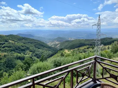 a view of a valley from the top of a mountain at Milmari M9 in Kopaonik