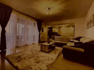 a living room with a couch and a table at Prelepa prostrana kuća in Šipačina