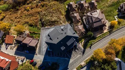 an overhead view of a house in a subdivision at Lawa Apartments Kopaonik in Cajetina