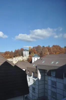 a view of roofs of buildings in a city at Studio SimpaKop in Kopaonik