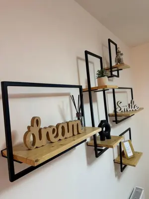 a mirror on a wall with a dream sign on it at Apartman Petrovic in Vranje
