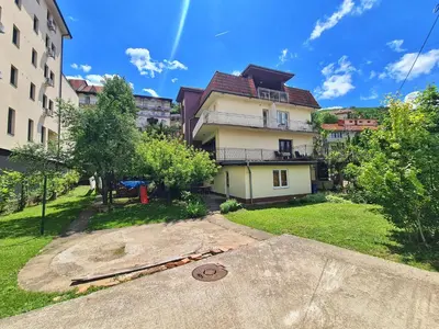 a view of a building with a house at Maja Vujković Apartman 1 in Soko Banja