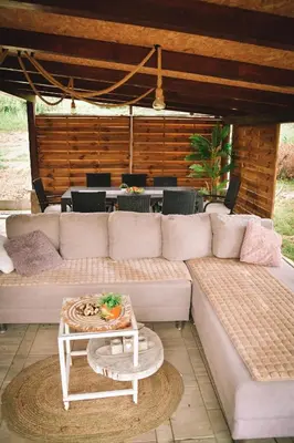 a living room with a couch and a table at Vila harmony in Trmčare