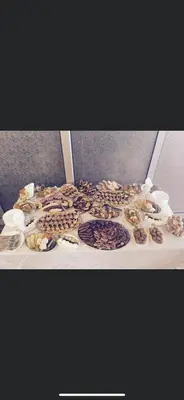 a table topped with donuts on top at Prenociste Gazela in Pirot