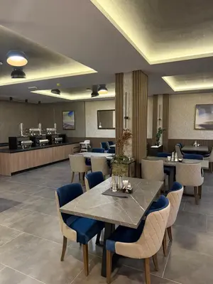 a conference room with a table and chairs at Sophie & Sarah Apartments - Residence Hill, Kopaonik in Kopaonik