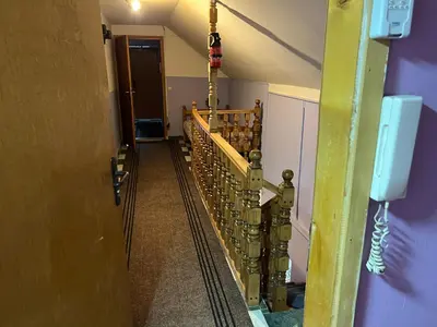 a hallway with a row of pipes in a room at Slobo Velickovic in Čerkeška Mala