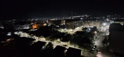 a view of a city at night with lights at Centar ljubavi in Kruševac