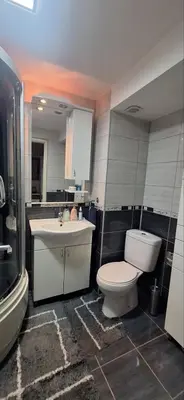 a bathroom with a toilet and a sink at Centar ljubavi in Kruševac