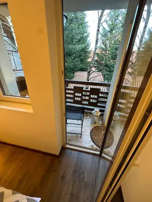 a view of a screened in porch from a glass door at Nomakop5 in Kopaonik