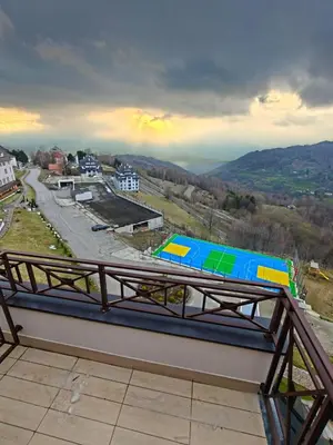a view of a tennis court on a roof at Apartments Kos - Milmari Resort in Kopaonik