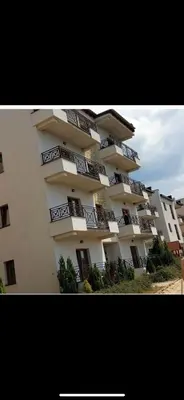 a large building with balconies on the side of it at Nikola Milmari in Kopaonik
