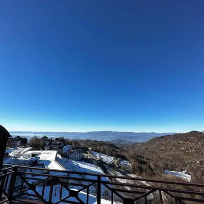 a view of a ski resort in the snow at Milmari kop in Raška